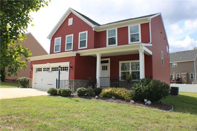 Beautiful home with front porch & full irrigation system! | Image 3