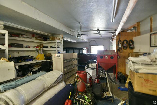 Storage room featuring a garage | Image 81