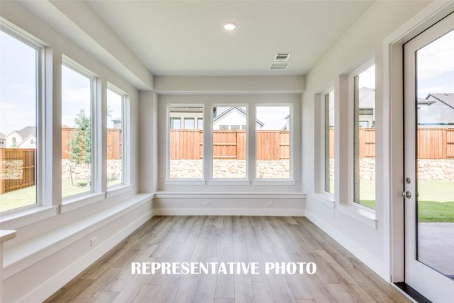 Grand dinner parties are in your future in this wonderful, light filled dining room! REPRESENTATIVE PHOTO. | Image 11