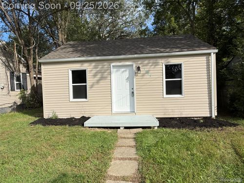 1225 Wells St, Burton, MI, 48529-1113 | Card Image