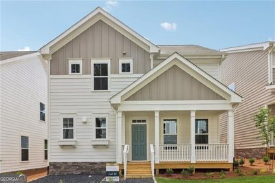 View of front facade featuring covered porch | Image 1