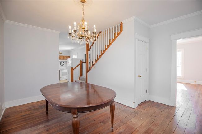 Dining room between living room & kitchen. | Image 5