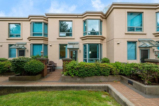 Rear view of house featuring stucco siding | Image 21