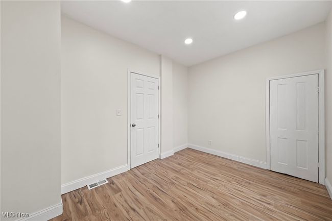 Empty room featuring light hardwood / wood-style floors | Image 16