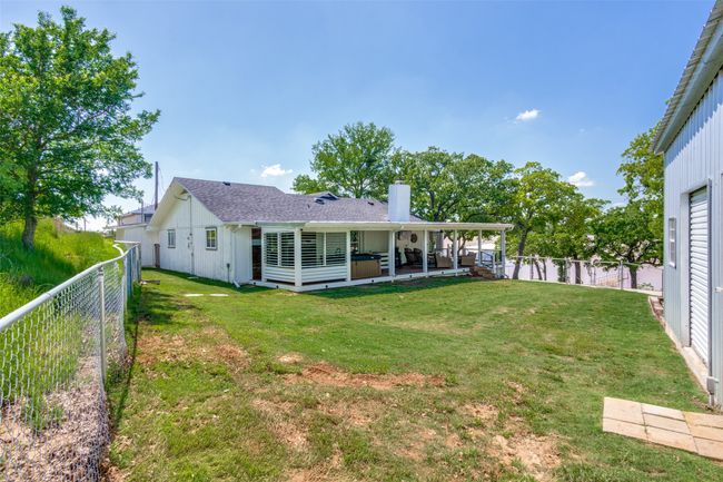 Spacious fenced backyard and shop | Image 31