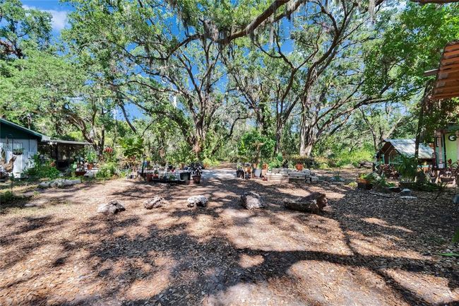 9724 Hermit Hollow Ln, House other with 4 bedrooms, 3 bathrooms and null parking in GIBSONTON FL | Image 70