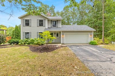 6540 Thimbleweed Lane Ne, House other with 3 bedrooms, 2 bathrooms and null parking in Rockford MI | Image 1