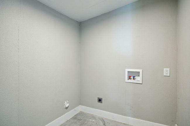 Laundry room with hookup for a washing machine and hookup for an electric dryer | Image 21