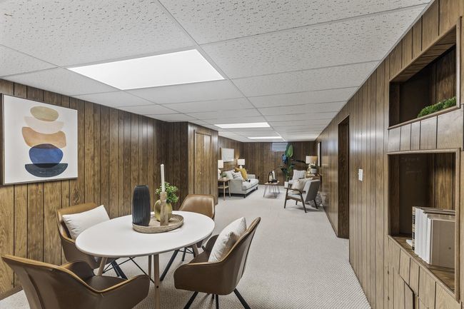 Lower level family room/rec space is perfect for a quiet night in or entertaining with friends. | Image 9