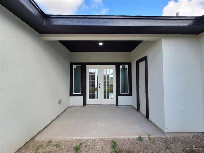 Doorway to property with french doors and a patio area | Image 23