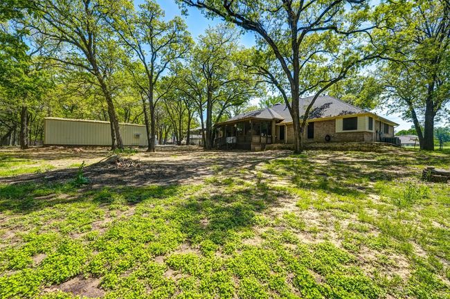 View of yard with a sunroom | Image 34