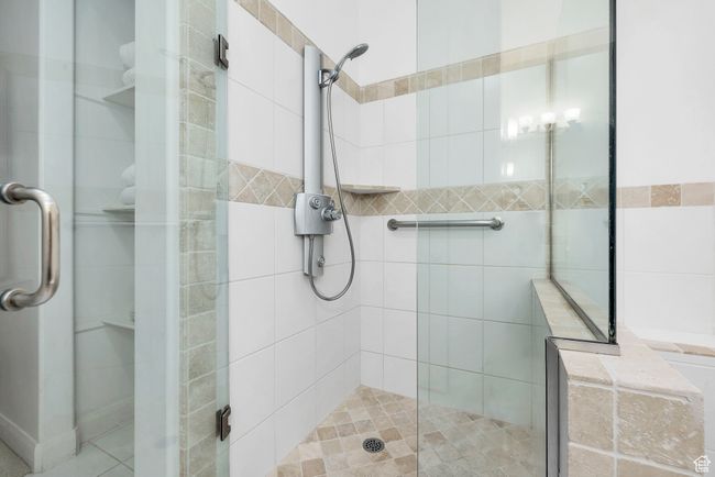 Bathroom with a shower stall | Image 25