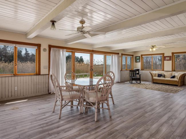 Beautiful, detailed ceilings with beams and wainscoting. | Image 6