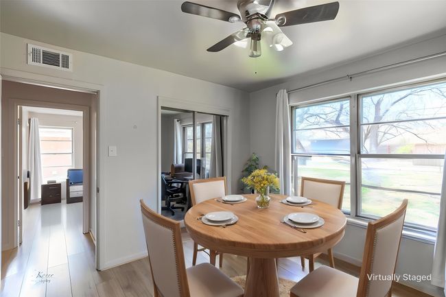 Dining room featuring ceiling fan, baseboards, and light wood-style flooring | Image 12