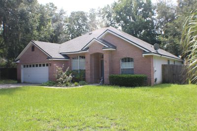 8653 Fieldstone Drive, Home with 3 bedrooms, 2 bathrooms and null parking in Yulee FL | Image 1