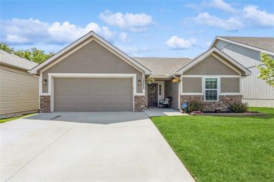 Craftsman-style home with a large front yard, garage and plenty of curb appeal! | Image 3