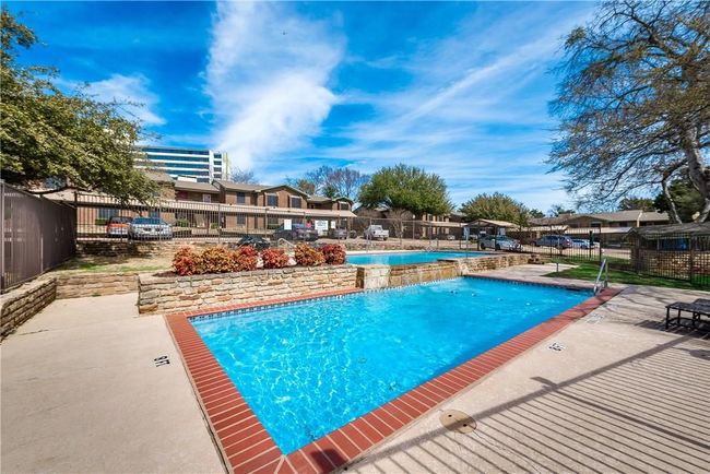 Community pool with a patio | Image 14