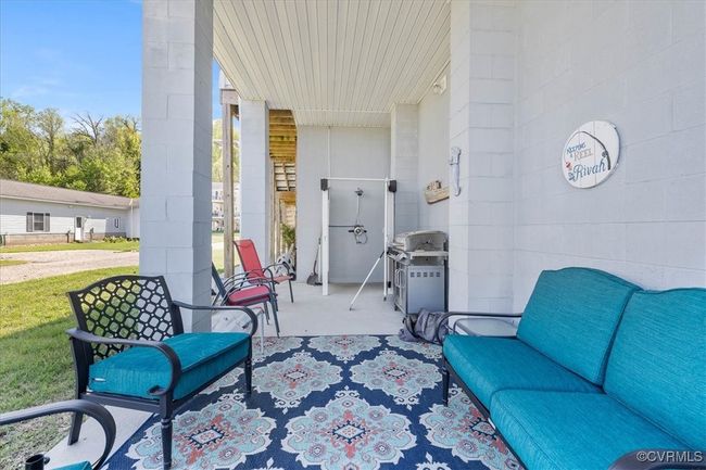 View of patio / terrace featuring a porch and grilling area and outdoor shower for those wonderful beach days! | Image 26