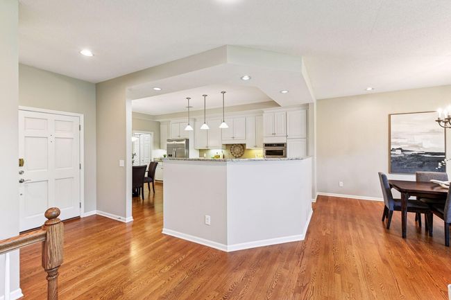 Beautifully appointed kitchen showcasing clean lines, neutral tones, and high-end finishes perfect for entertaining. | Image 10