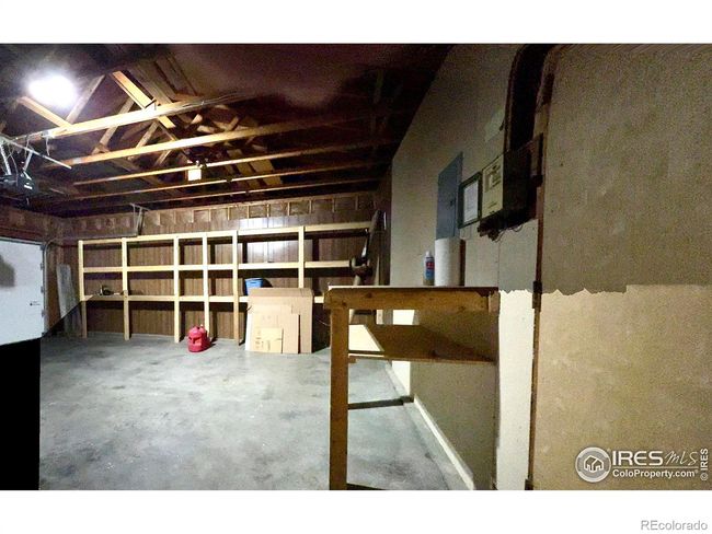 OVERSIZED GARAGE WITH WORK BENCH AND SHELVING | Image 25