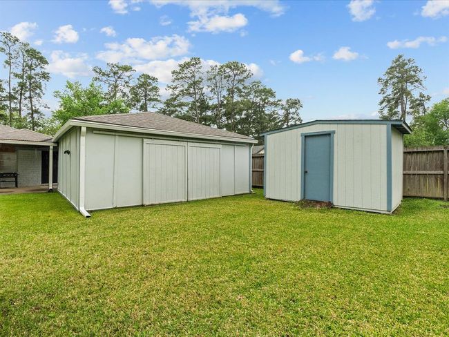 Detached garage plus bonus shed for all your extra storage! | Image 23
