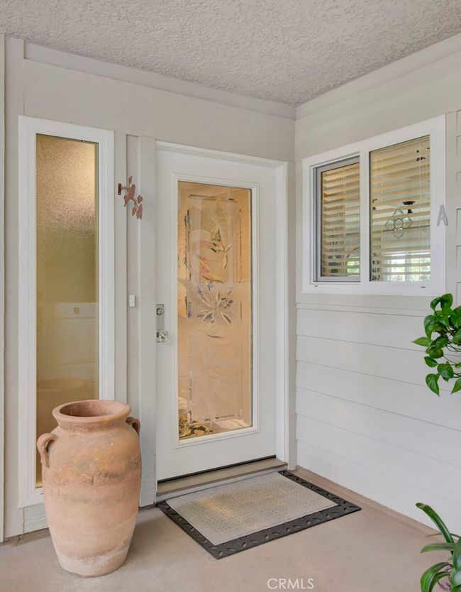 Gorgeous custom front door with etched glass insert. | Image 4