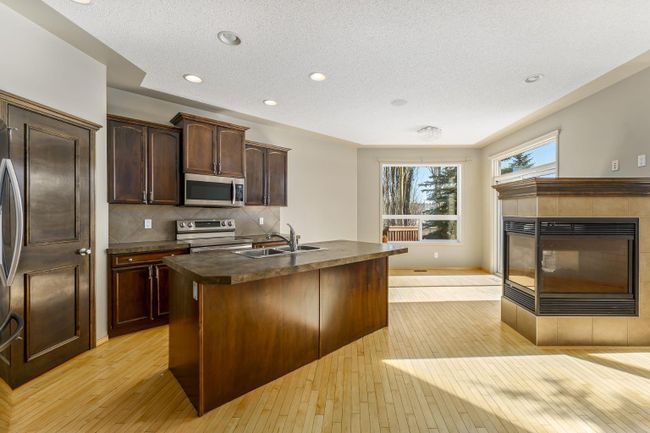 202 Tuscany Ravine Close Nw, Home with 4 bedrooms, 3 bathrooms and 4 parking in Calgary AB | Image 15