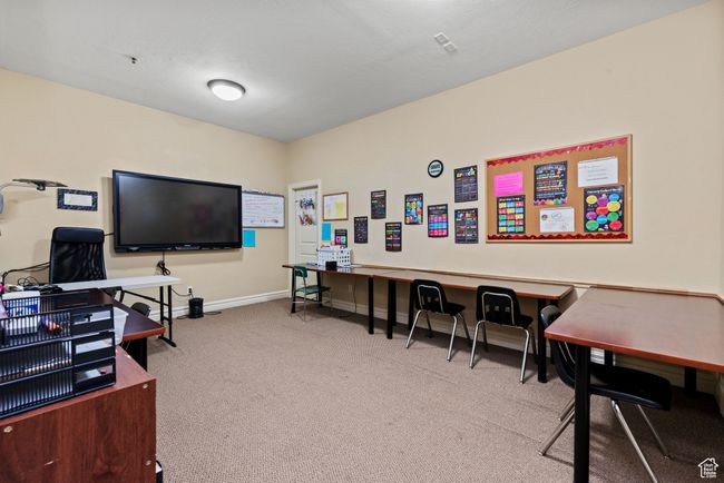 Office area with carpet and baseboards | Image 30