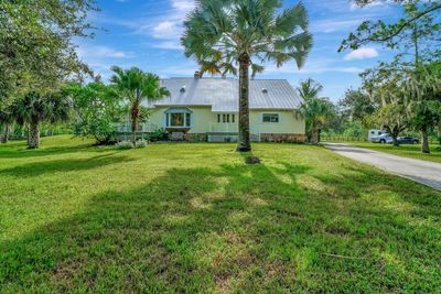 5212 Homeland Road, House other with 4 bedrooms, 3 bathrooms and null parking in Lake Worth FL | Image 1