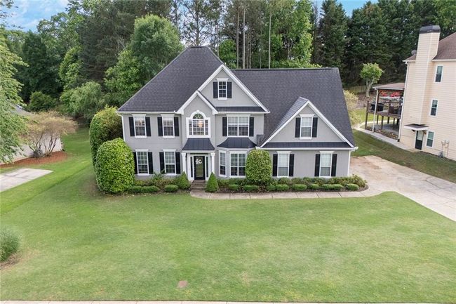225 Ruby Forest Pkwy, House other with 4 bedrooms, 3 bathrooms and 5 parking in Suwanee GA | Image 4