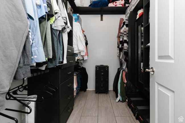View of walk in closet | Image 15