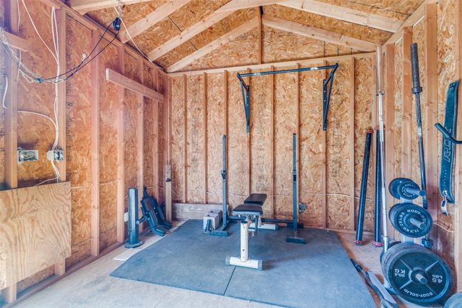 Versatile detached backyard structure —currently set up as a home gym, perfect for hobbies or storage. | Image 19