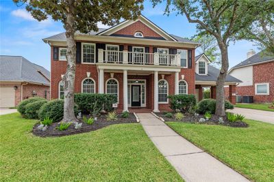 Welcome home to 24403 Falcon Point Drive in the highly sought after Falcon Point community in Katy! | Image 1