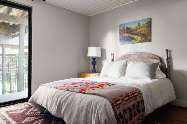 Bedroom featuring access to exterior and wood finished floors | Image 17