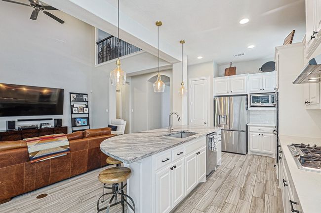 Open floorplan so the chef doesn't miss any action in the Living Room. | Image 9