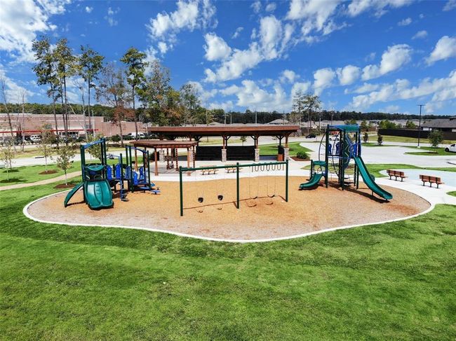 Just steps from the pool area, the playground is a fun and safe space where kids can let their imaginations run wild. | Image 32