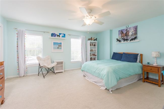 Bedroom featuring carpet floors and a ceiling fan | Image 18