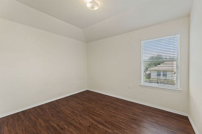 Empty room with dark wood-style floors | Image 16