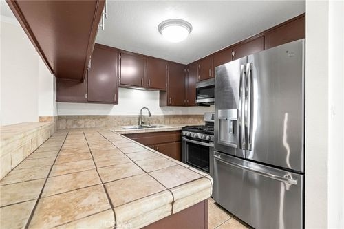 1j-3050 S Bristol St, Santa Ana, CA, 92704-6701 | Card Image
