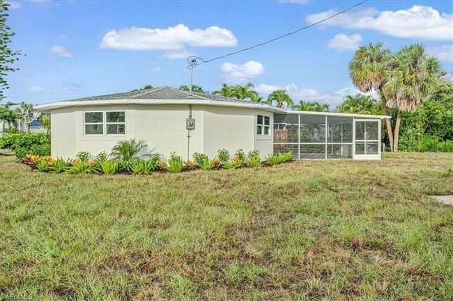 Rear view of house showing Screened Lanai - Virtually edited | Image 27