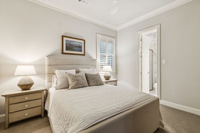Downstairs secondary bedroom with attached full bathroom | Image 19