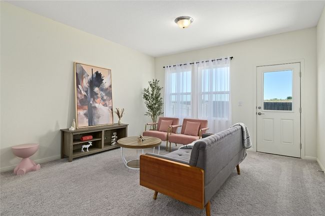 Living area with carpet floors and baseboards | Image 14