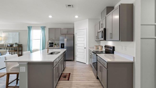 33620 Seattle Slew Dr, House other with 5 bedrooms, 3 bathrooms and null parking in SORRENTO FL | Image 7