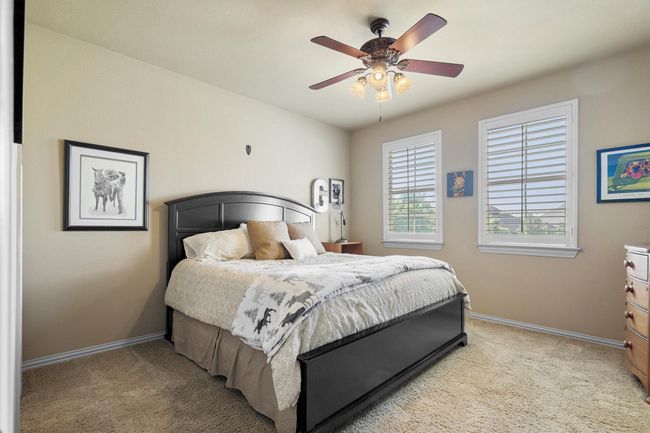 One of the three secondary upstairs bedrooms, all with walk-in closets | Image 26