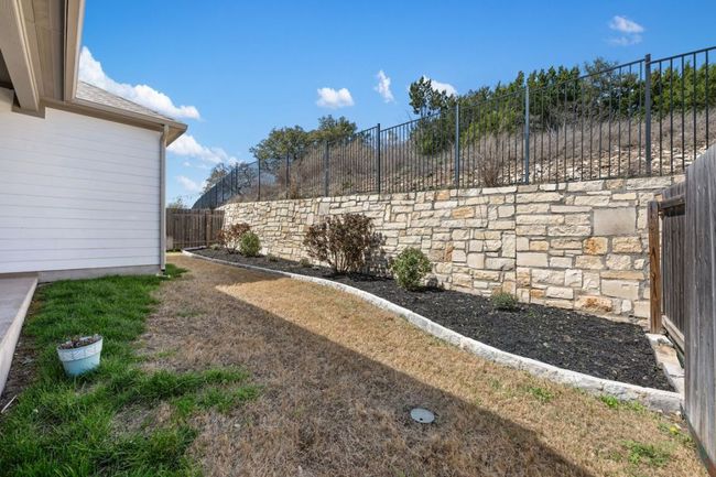 View of yard featuring a fenced backyard | Image 31