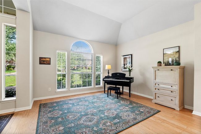 The neutral-toned walls and wood shutters lend a touch of sophistication, enhancing the room’s warm, welcoming feel | Image 5