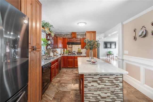 4983 Arcado Rd Sw, House other with 5 bedrooms, 2 bathrooms and 6 parking in Lilburn GA | Image 13