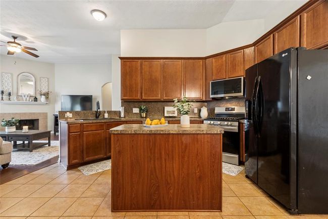 Nice size kitchen island for extra prep space or serving. | Image 13