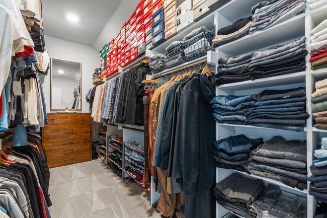 Spacious closet with carpet floors | Image 19