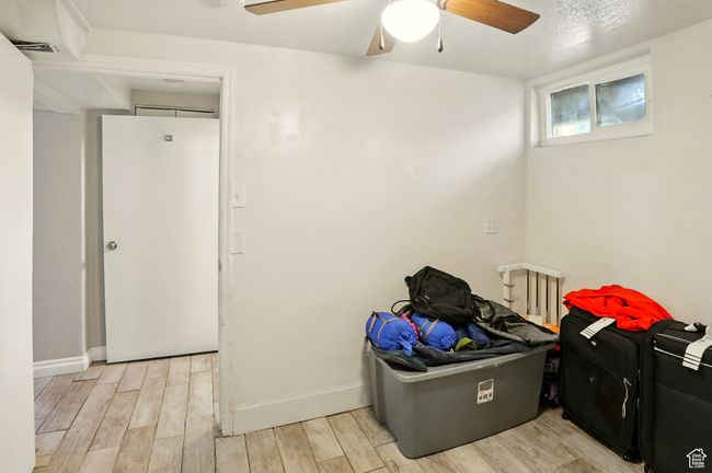 Interior space featuring a ceiling fan | Image 20